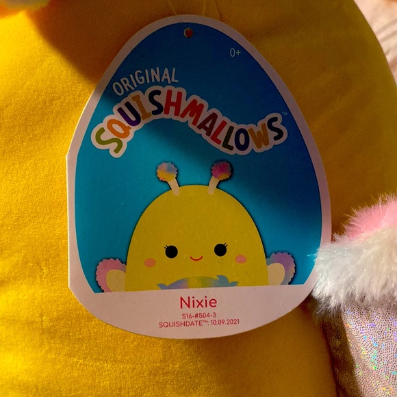 This is Nixie she is so soft and squishy. She is yellow with rainbow accents - Picture 2 of 2